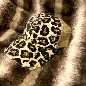 Trucker cap with opening for ponytail